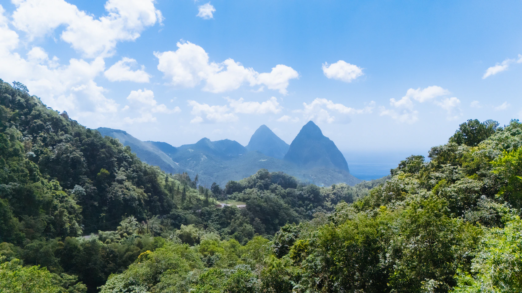 Gros Piton and Petit Piton rising beyond Saint Lucia's dense rainforest