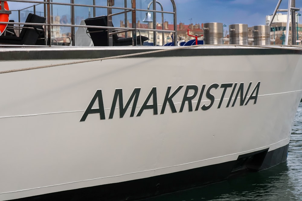 a large white boat sitting in the water