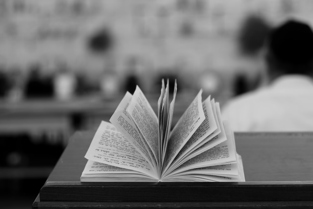 an open book sitting on top of a table