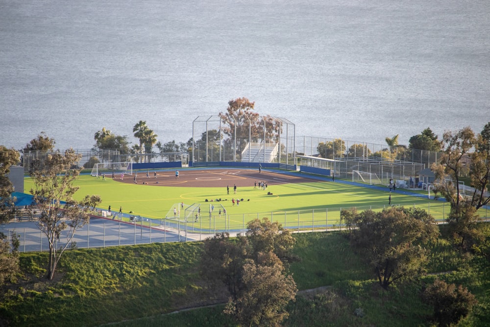 a view of a baseball field from a hill