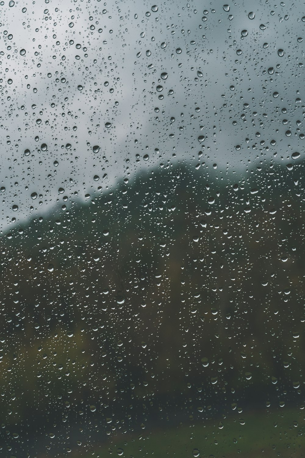 a window with rain drops on it