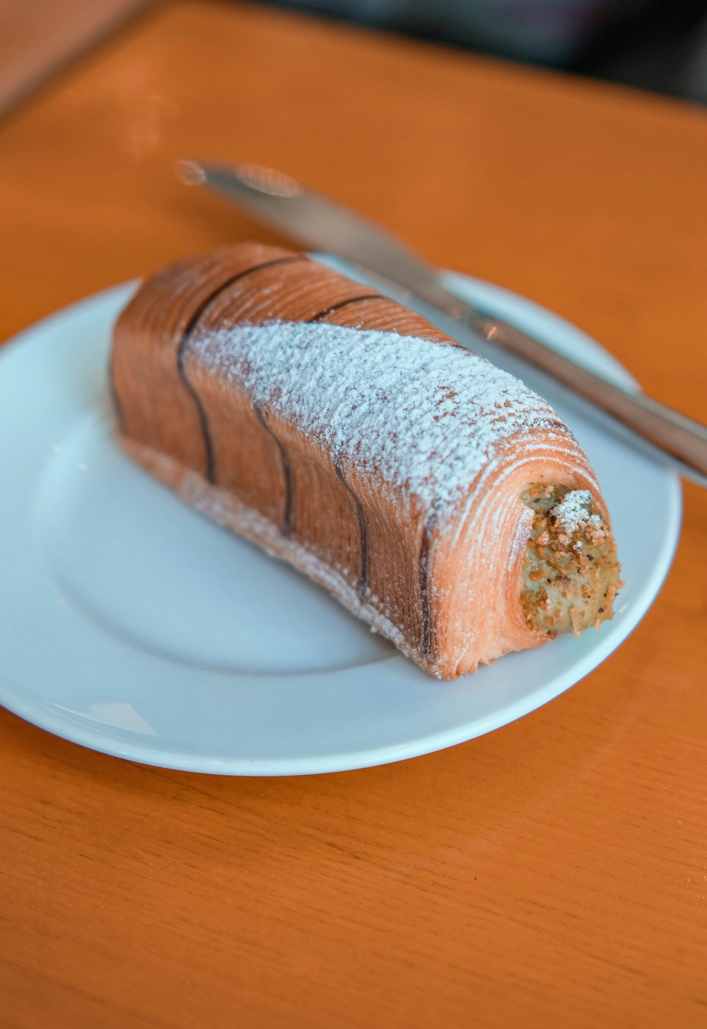 a piece of cake on a plate with a fork