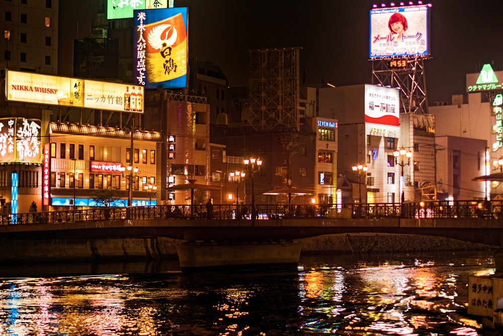 a river running through a city at night