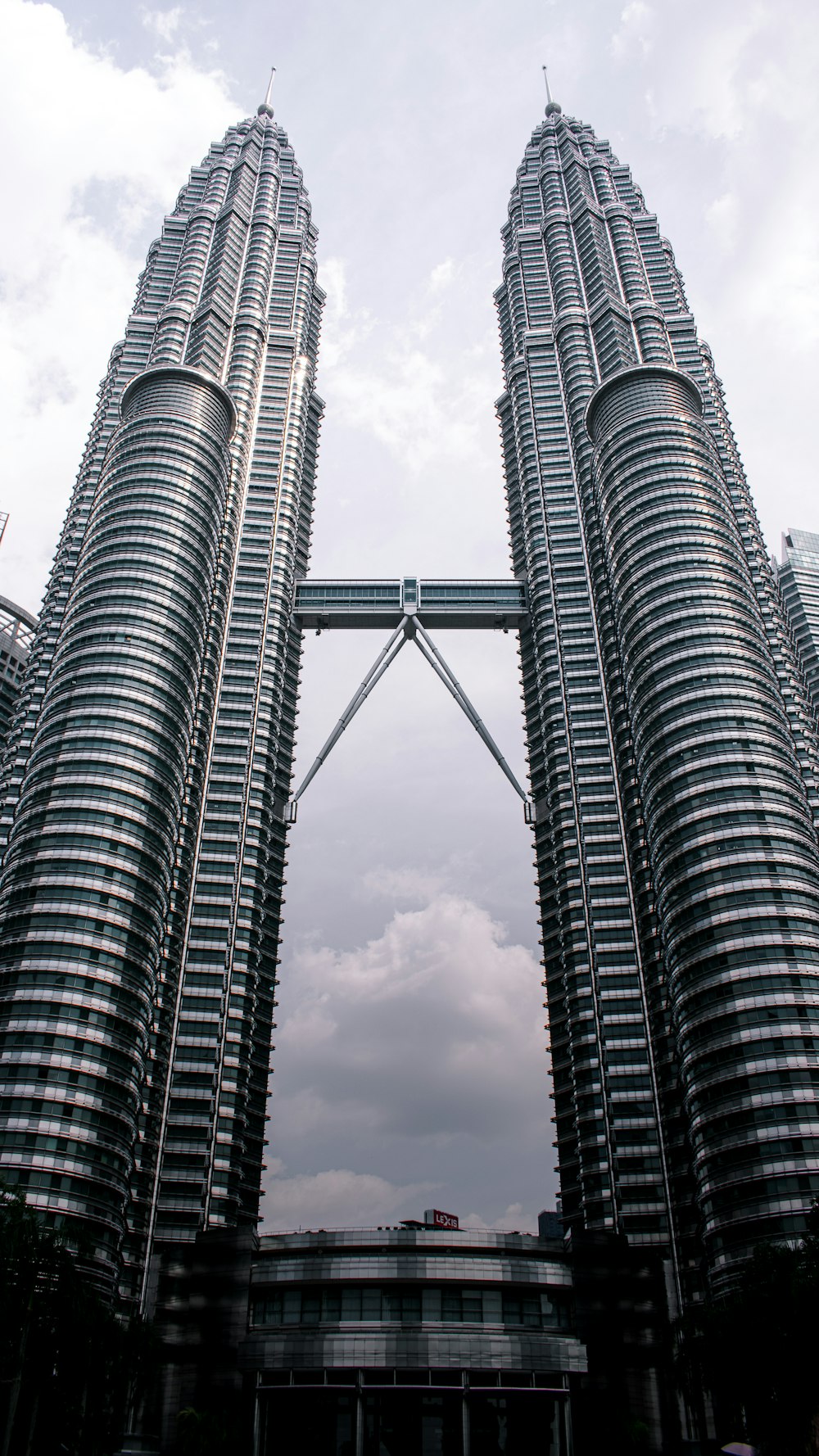 a couple of tall buildings towering into the sky