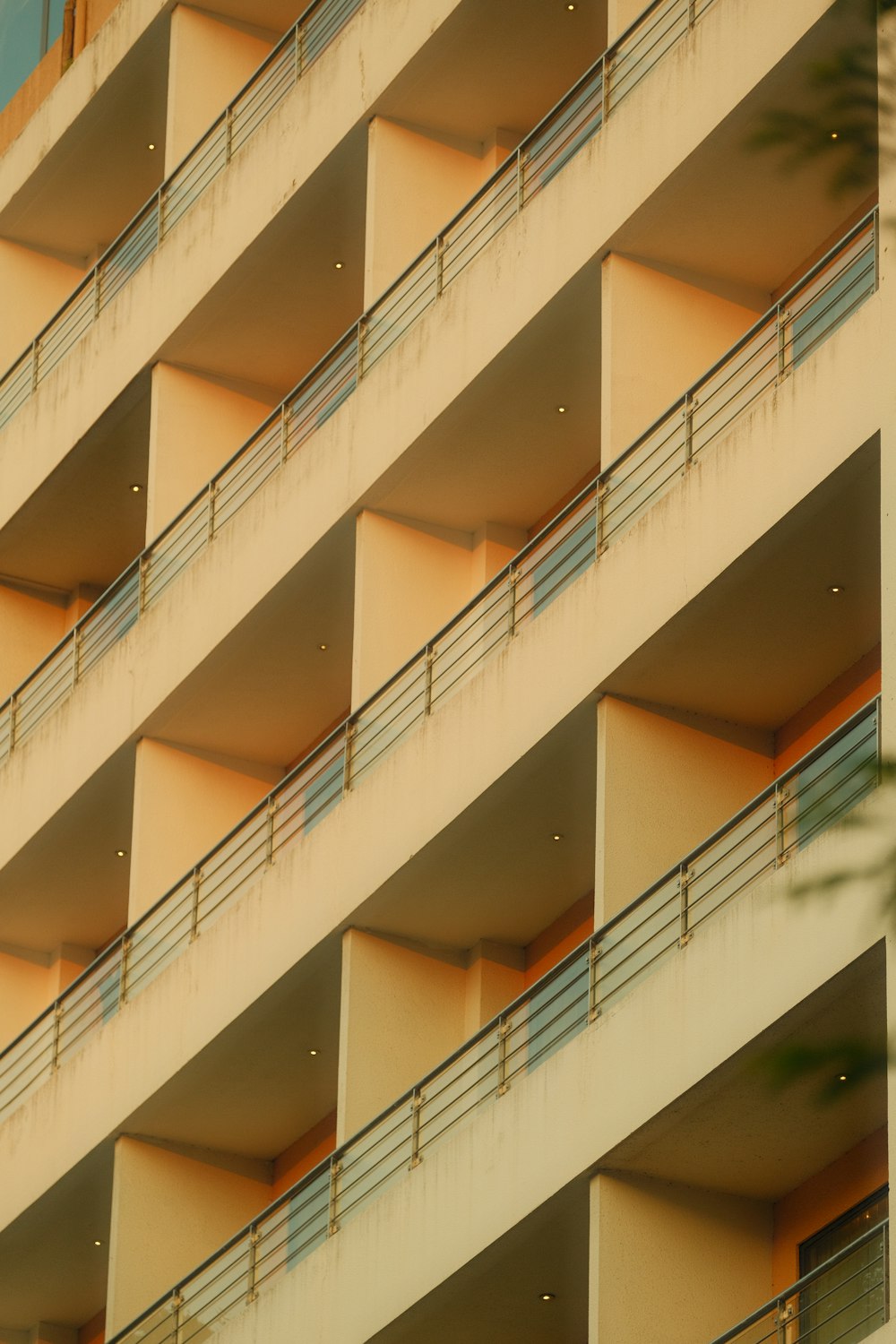 a tall building with balconies and balconies on the balconies