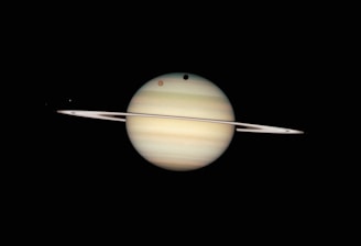 saturn and its rings in the dark sky