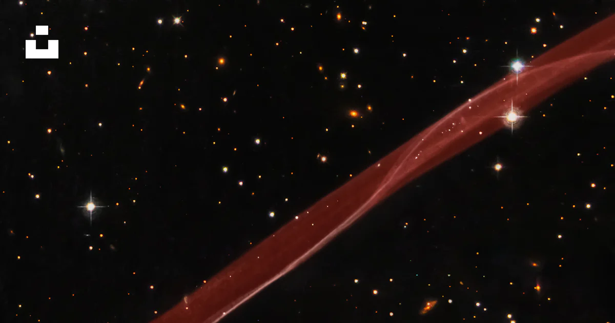 A red ribbon flying through the night sky photo – Free Outer space ...