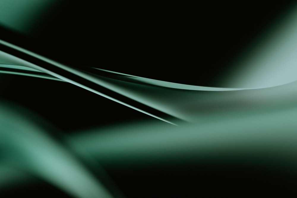 una foto sfocata di uno sfondo nero e verde