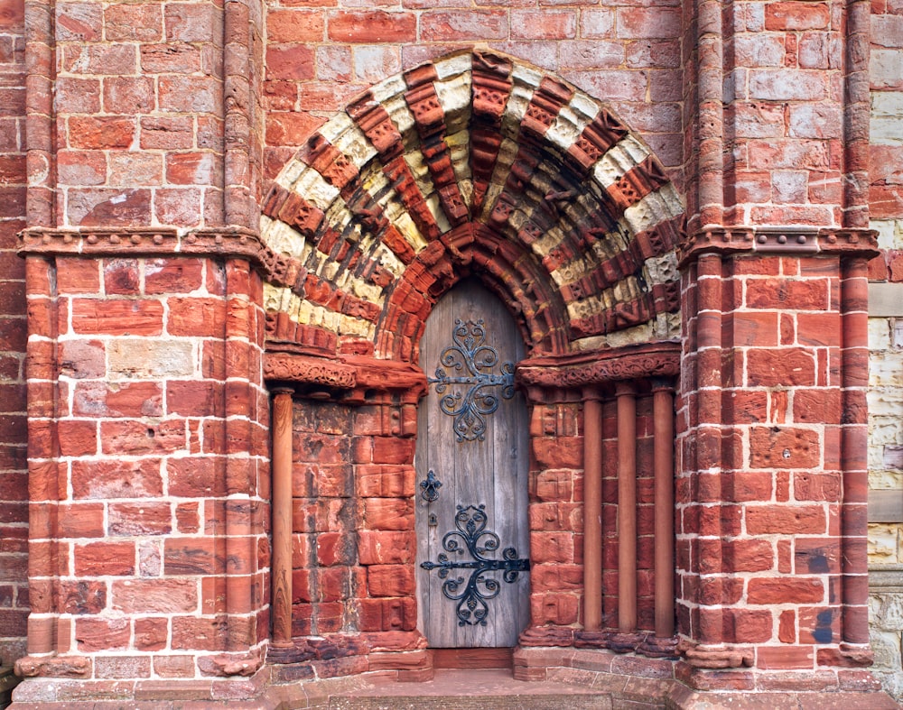 a wooden door with a decorative design on it