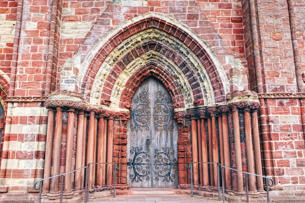 an old building with a large wooden door