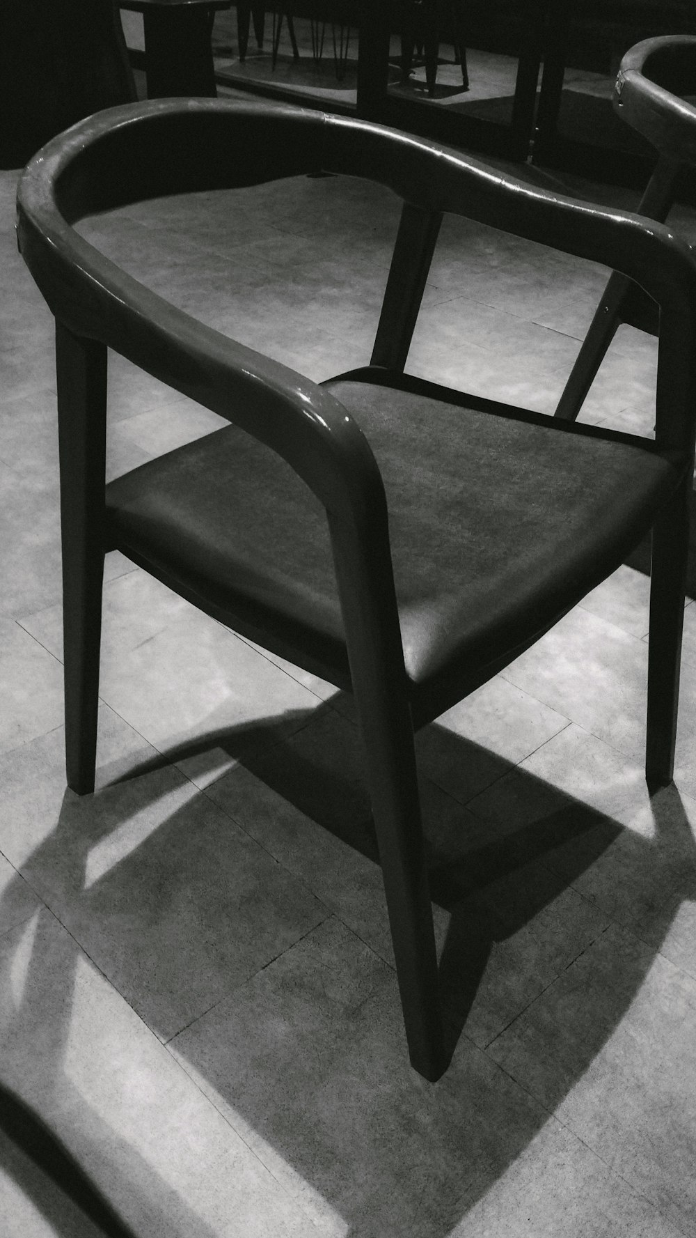 a black and white photo of a chair