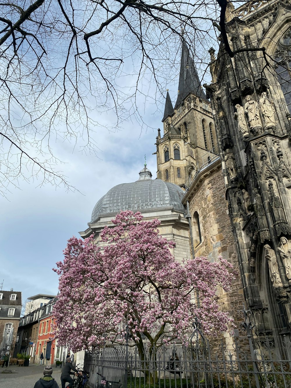 a large building with a tree in front of it