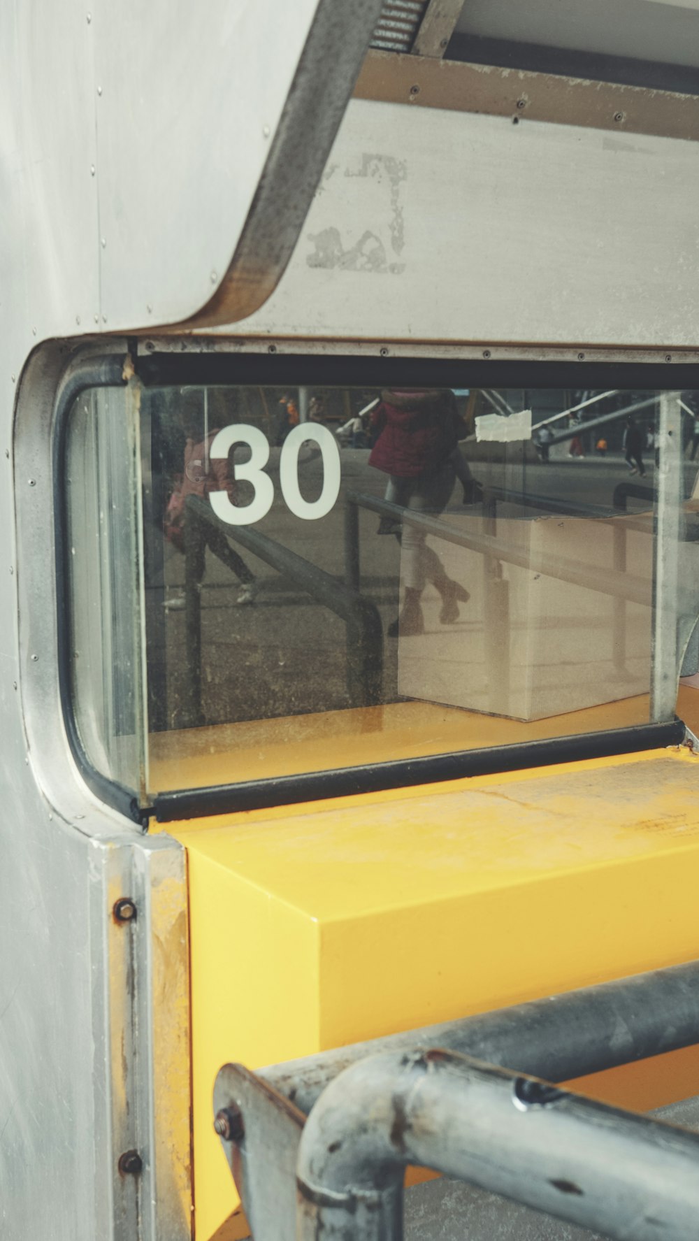 a close up of a window on a bus