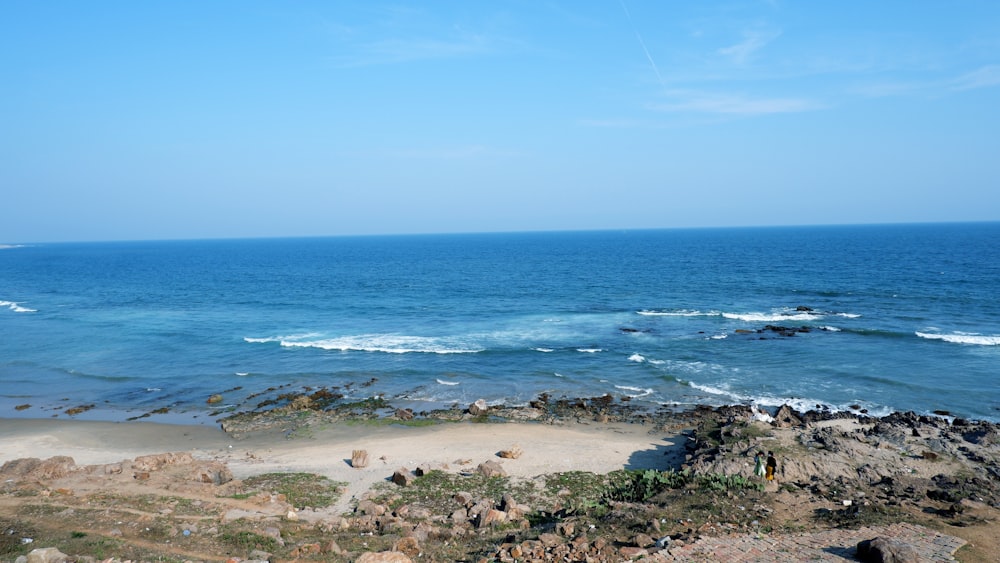 a view of the ocean from a rocky cliff