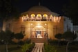 a large building with lights on it at night