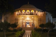 a large building with lights on it at night