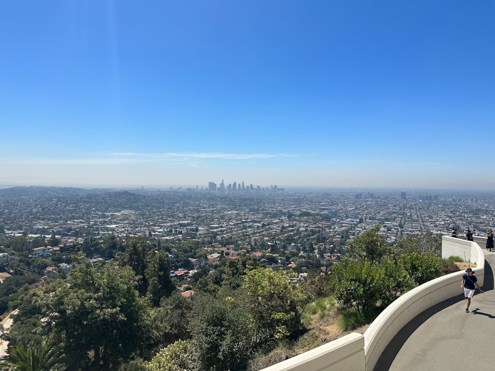 a view of the city from the top of a hill