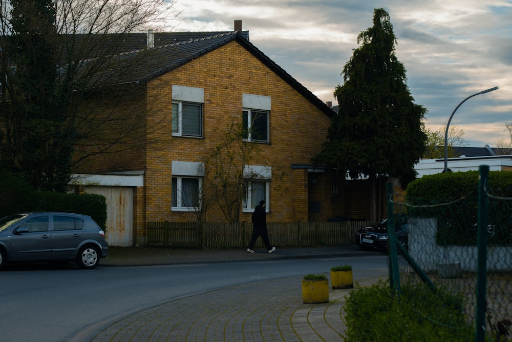 a car is parked in front of a house