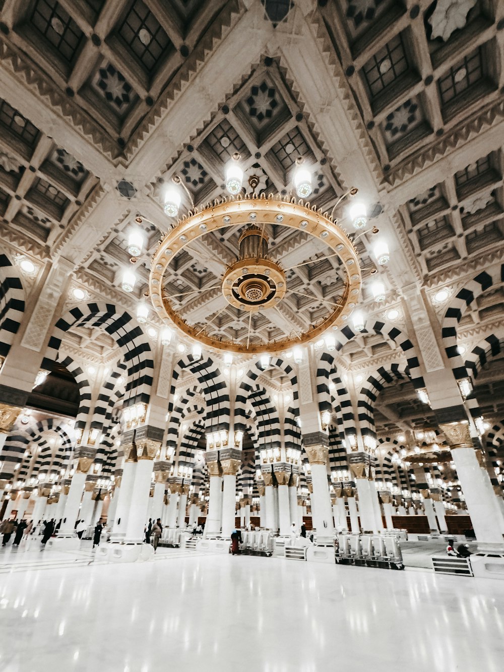 a large room with a chandelier in the middle of it