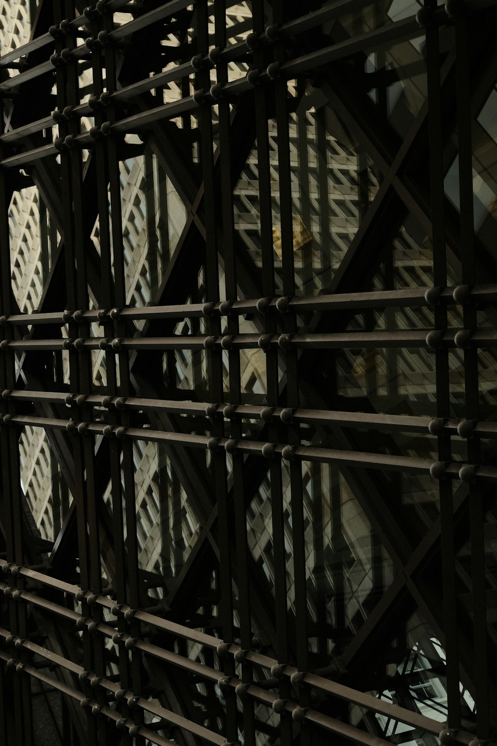 a close up of a metal structure with a clock on it