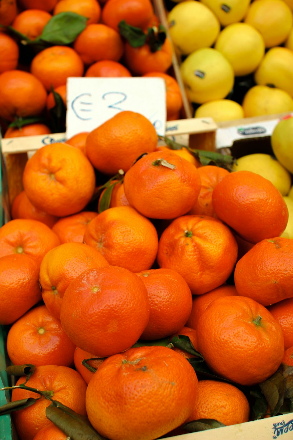 a pile of oranges sitting next to each other