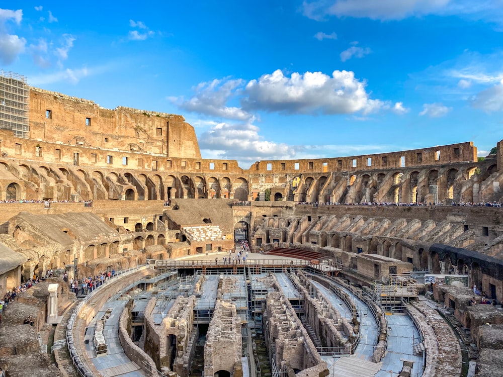 the interior of a roman colossion with a blue sky in the background