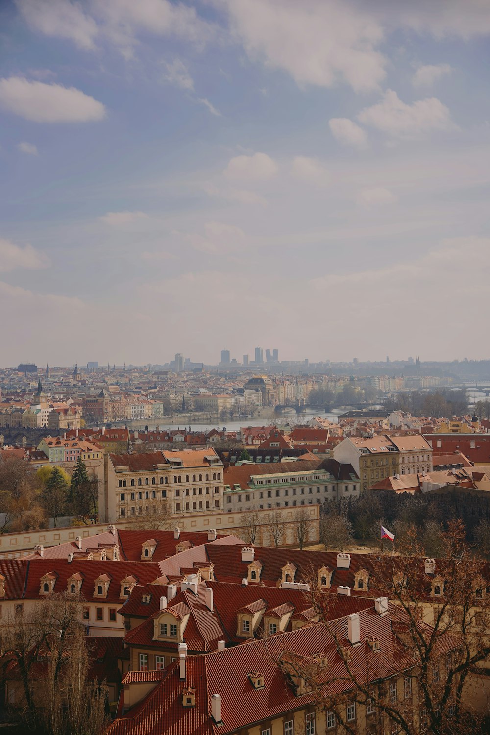 a view of a city from the top of a hill