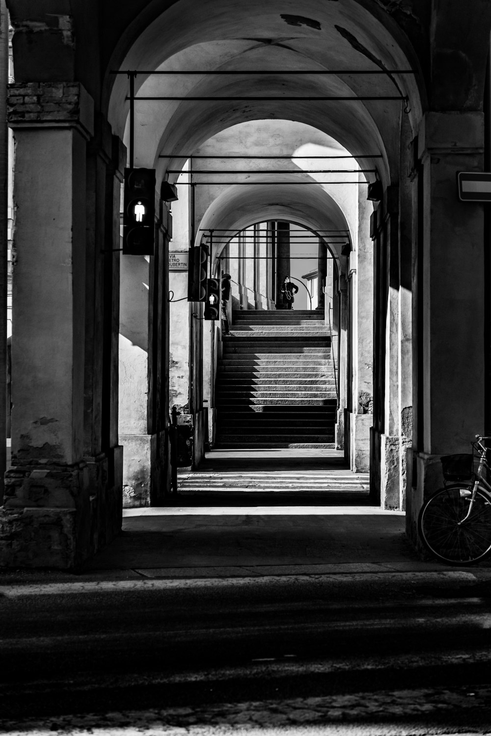 a bike is parked in front of a building