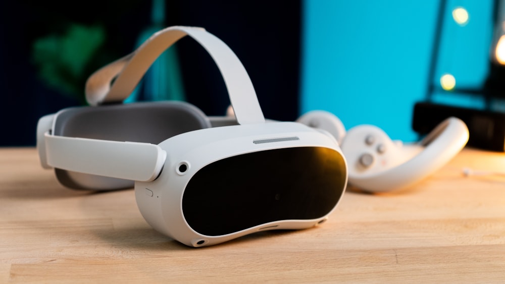 a pair of virtual glasses sitting on top of a wooden table