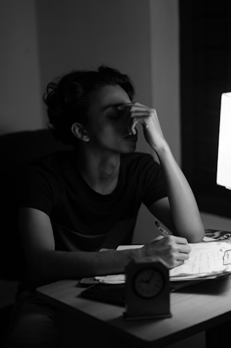Writer planning script beats that help viewers re-enter a long-form YouTube video