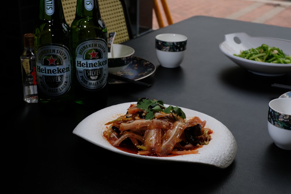 a plate of food sitting on top of a table