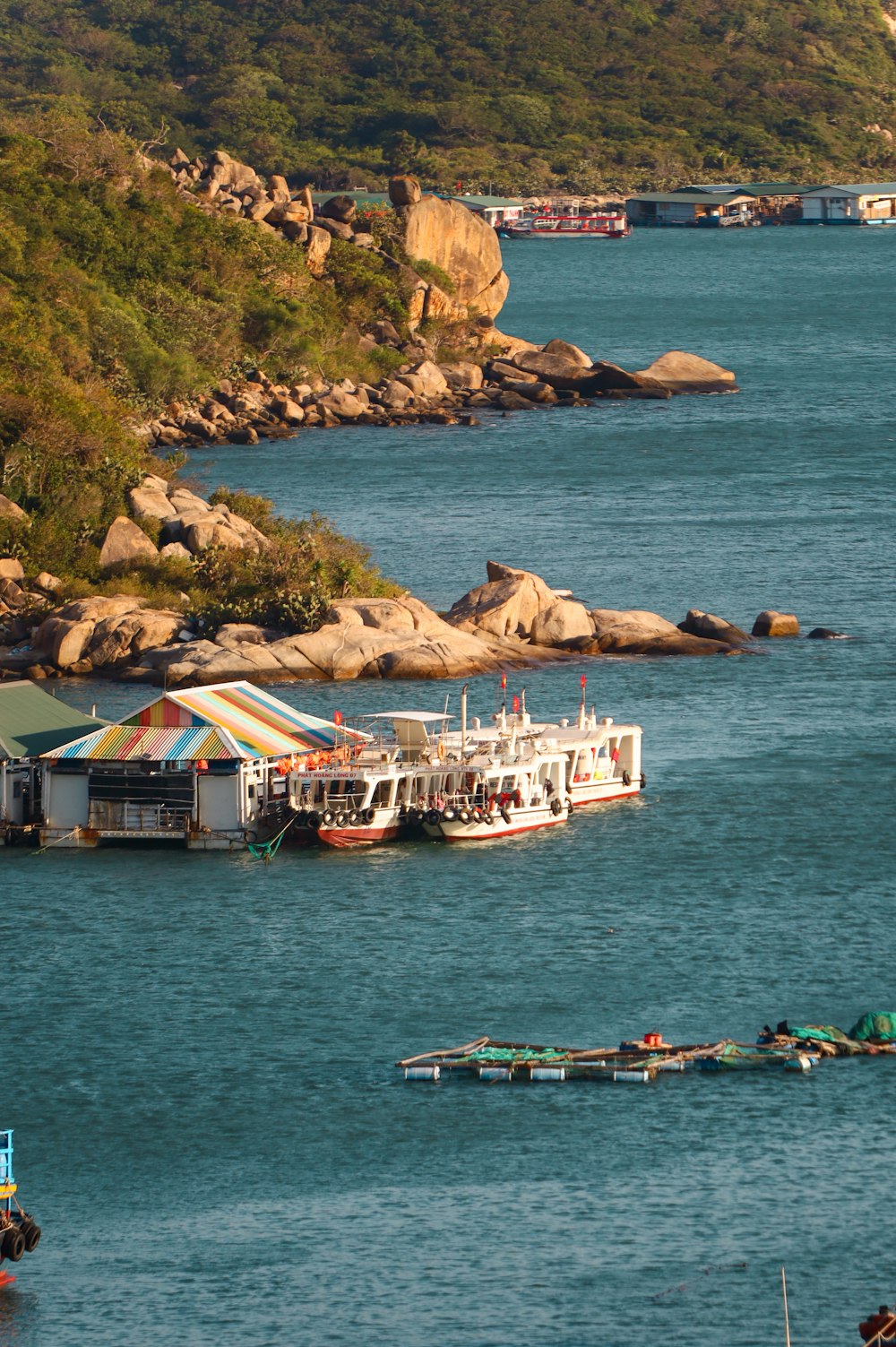 a large boat floating on top of a body of water