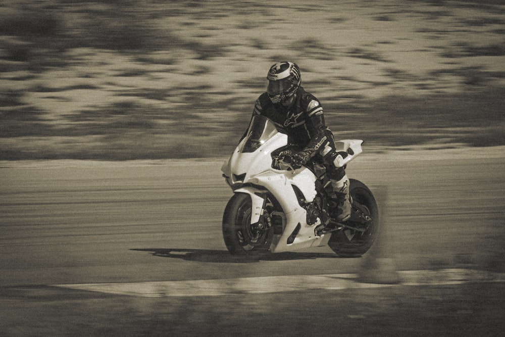 a person riding a motorcycle on a road