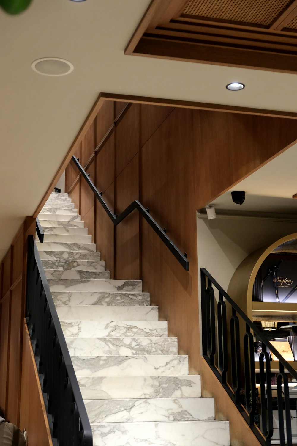 a set of stairs leading up to a living room