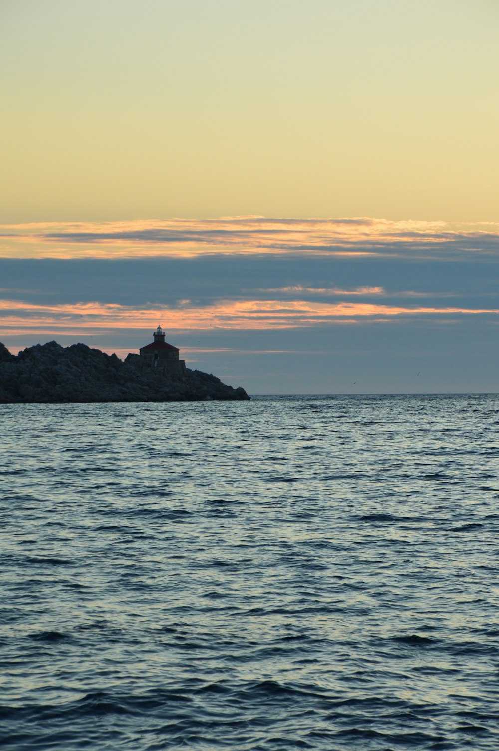 a small island in the middle of a body of water