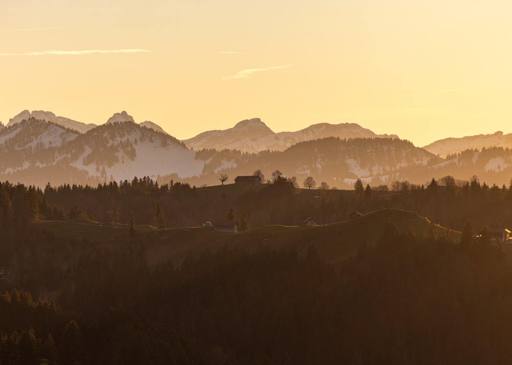 a view of a mountain range at sunset