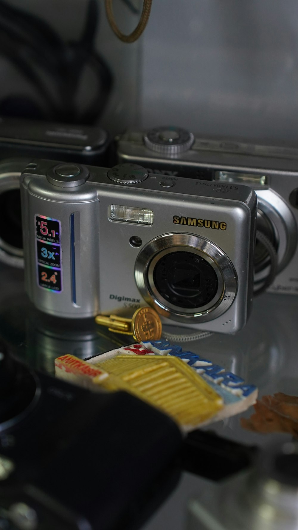 a digital camera sitting on top of a table