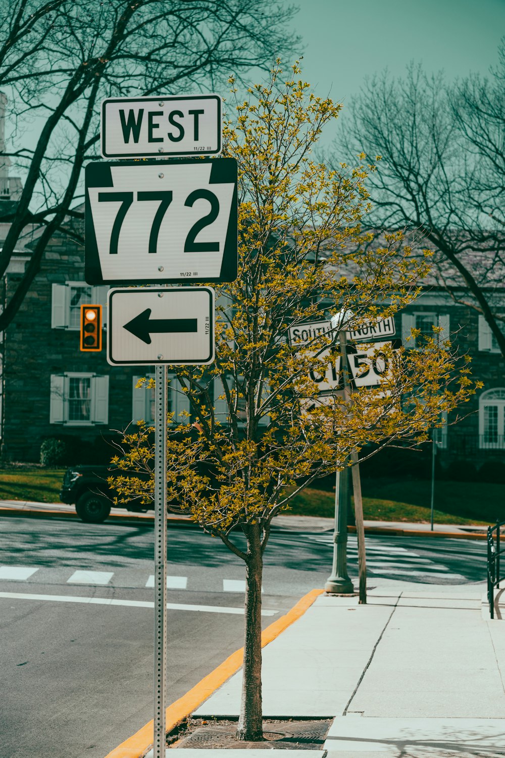 a street sign on the side of the road