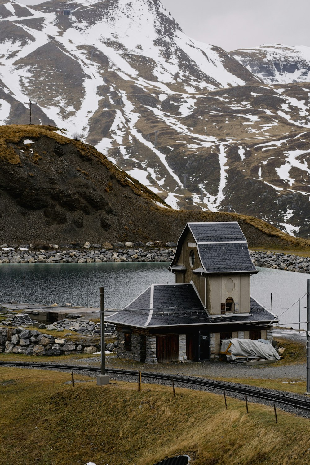 a house with a mountain in the background