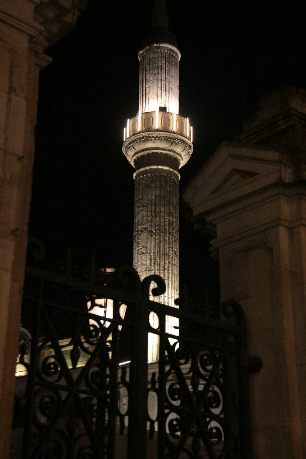 a tall tower with a light on top of it