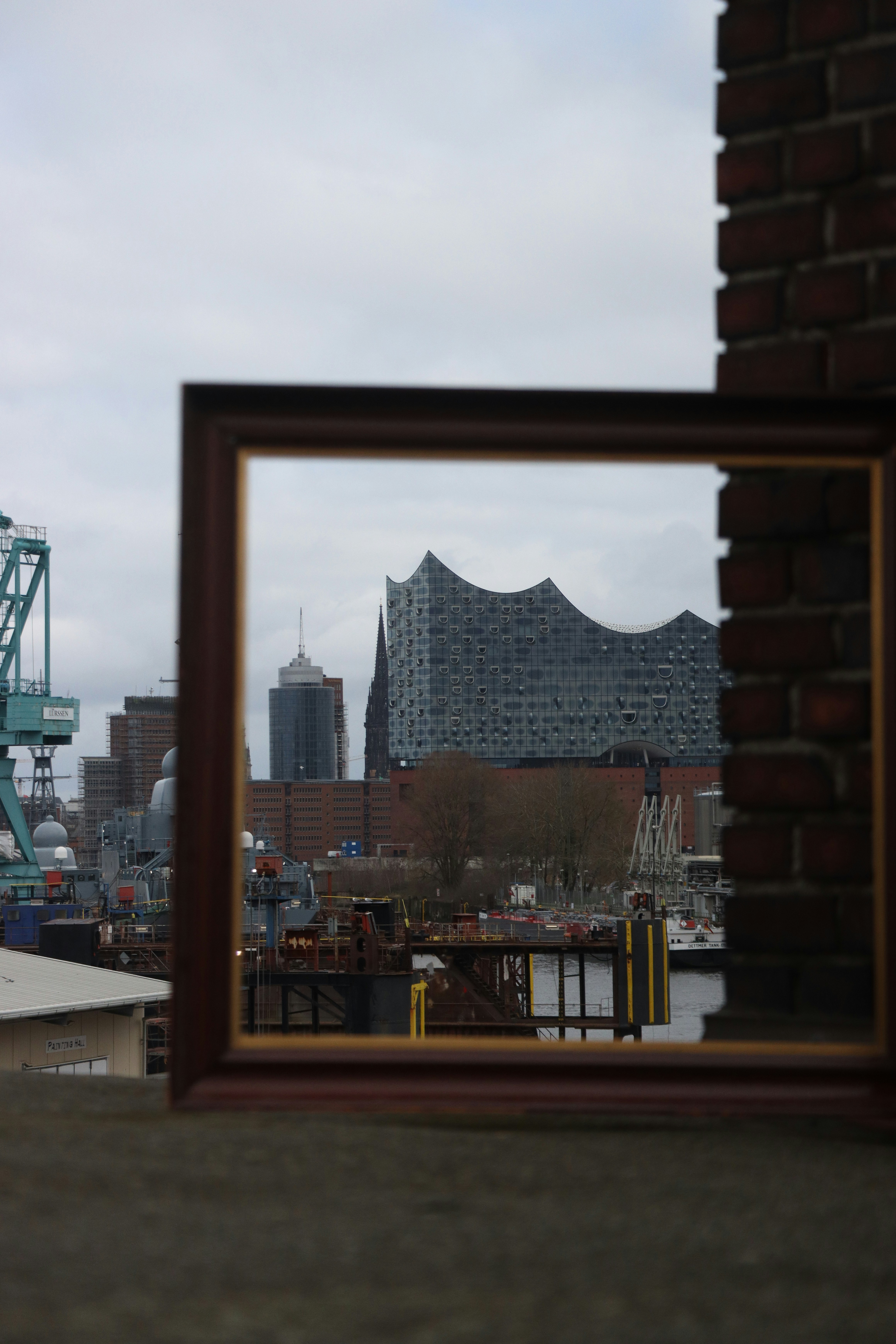 a picture of a city taken through a mirror