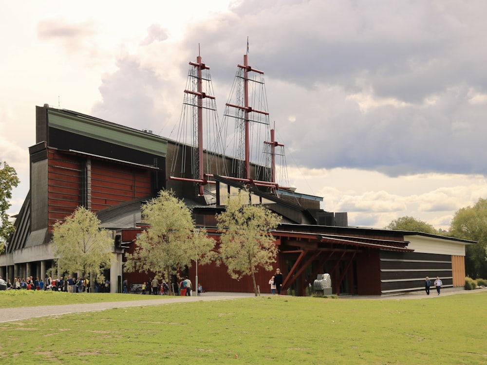 a large building with a tall boat on top of it