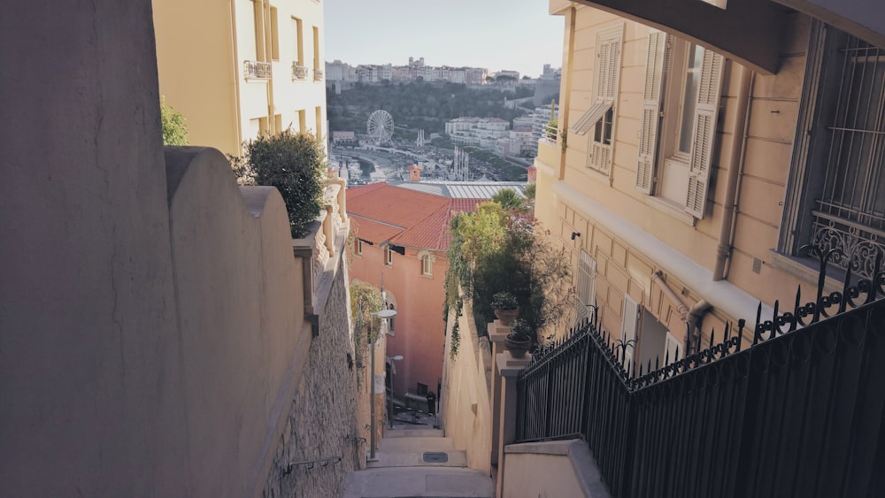 a narrow city street with buildings on both sides