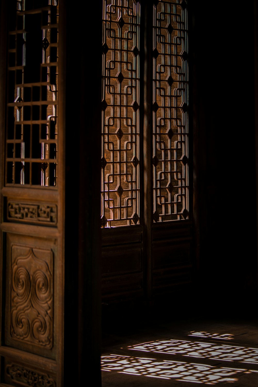 a large wooden door with intricate carvings on it
