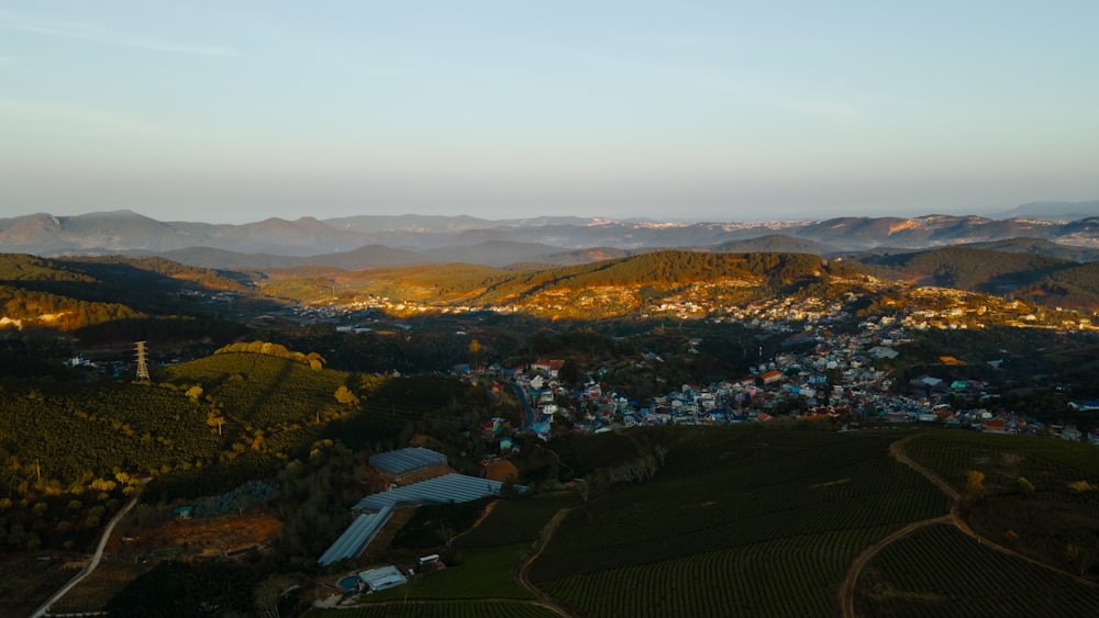 an aerial view of a small town in the mountains