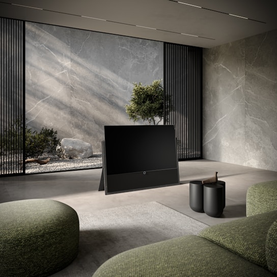 a living room with stone walls