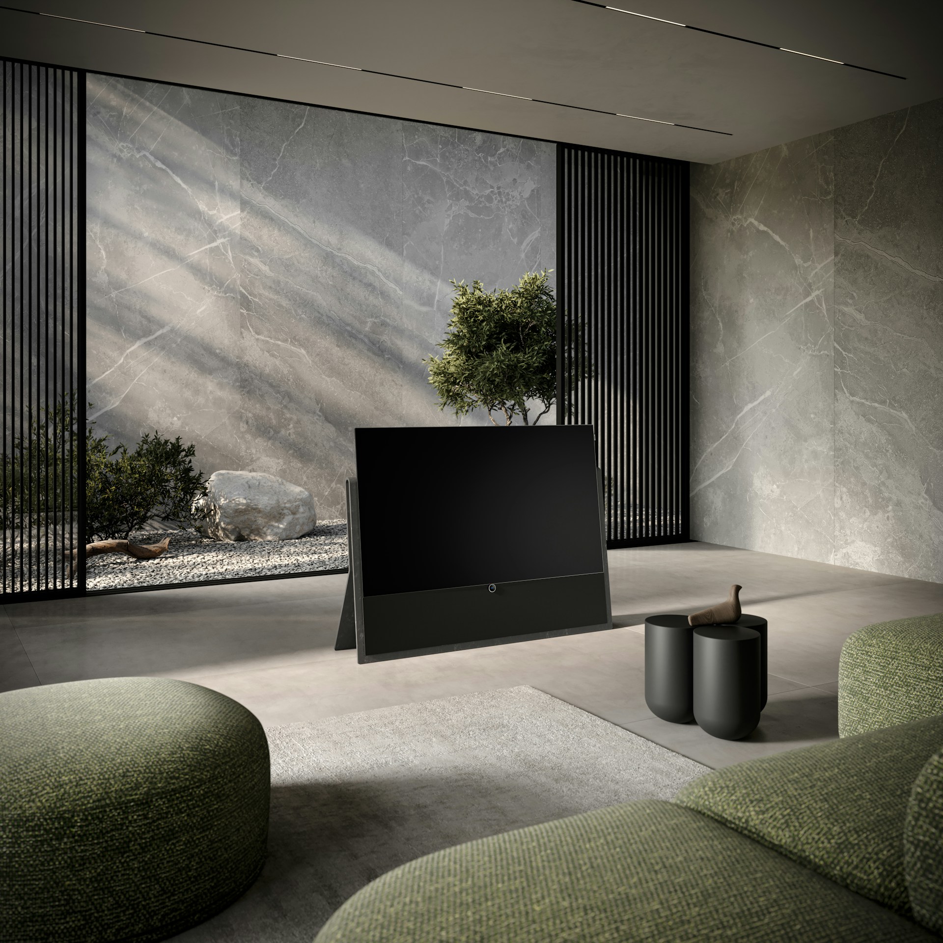 a flat screen tv sitting on top of a tv stand