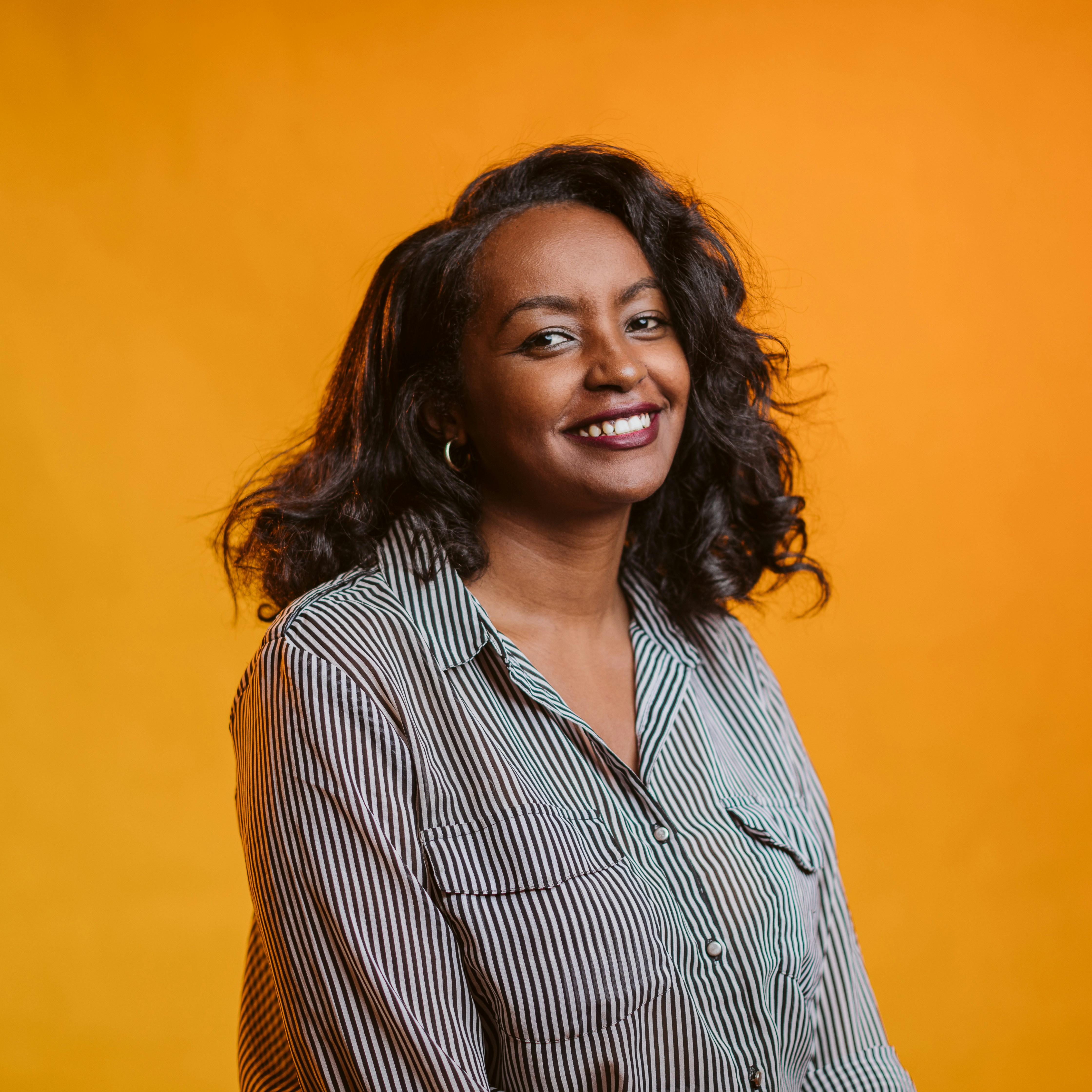 a woman with a smile on her face