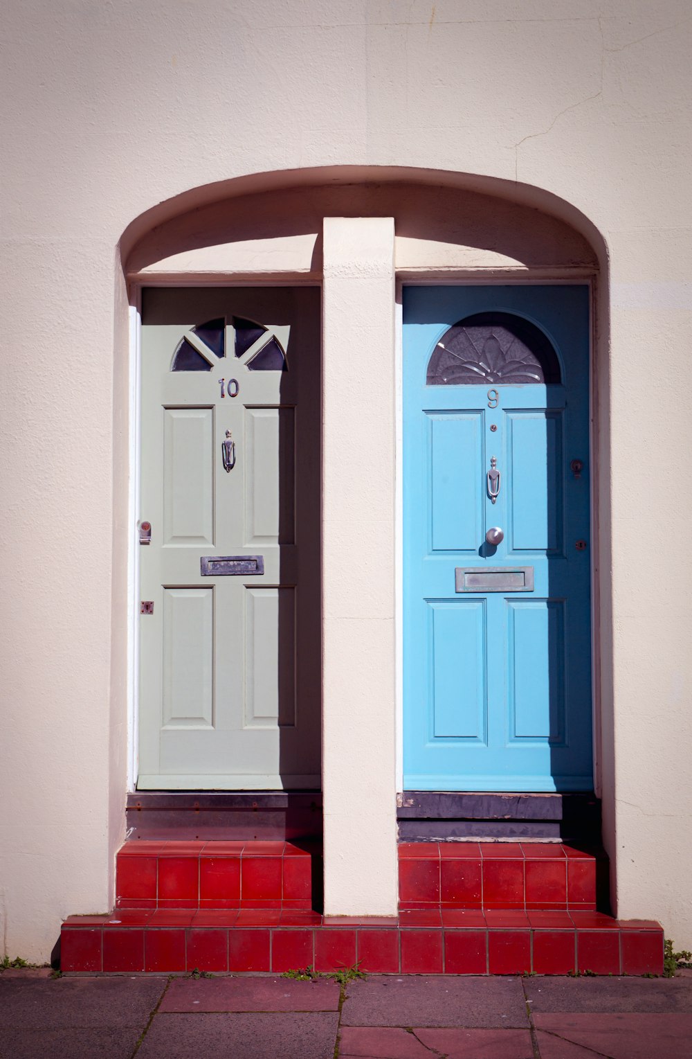 a couple of blue doors sitting next to each other