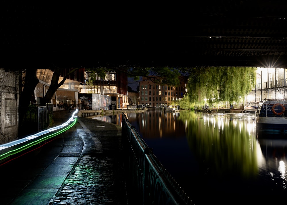 a long exposure photo of a river at night